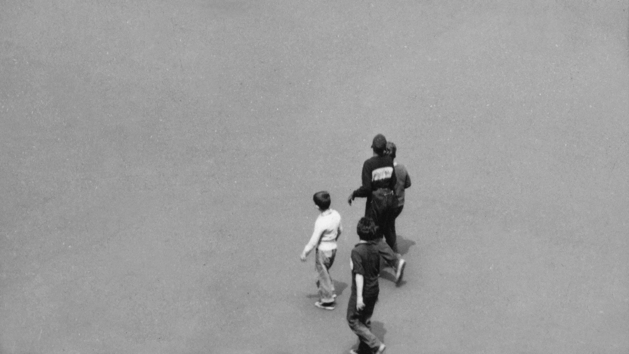 Four boys walking in Manhattan, 1963